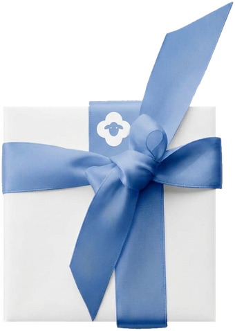 A white gift box tied with a blue ribbon: a tarot card inside